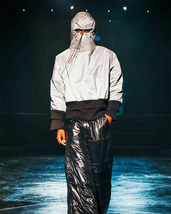 Model walks the AQUA show.